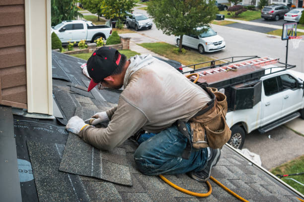 Professional Roofing technician working in Irvington, NJ